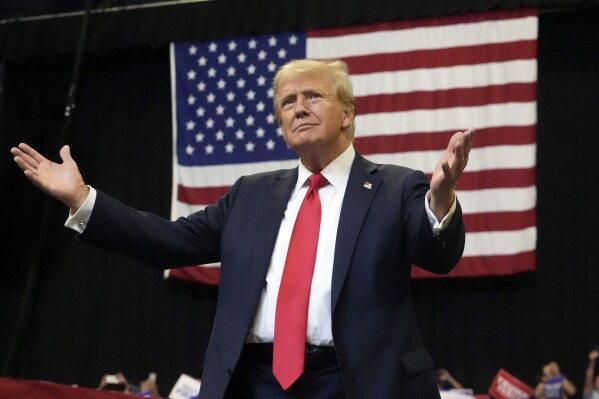 Republican presidential nominee former President Donald Trump arrives to speak at a campaign rally in Bozeman, Mont., Friday, Aug. 9, 2024. (AP Photo/Rick Bowmer)