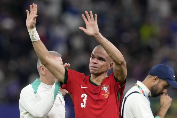 FILE - Portugal's Pepe cries after losing a quarter final match between Portugal and France at the Euro 2024 soccer tournament in Hamburg, Germany, July 5, 2024. (AP Photo/Martin Meissner, File)