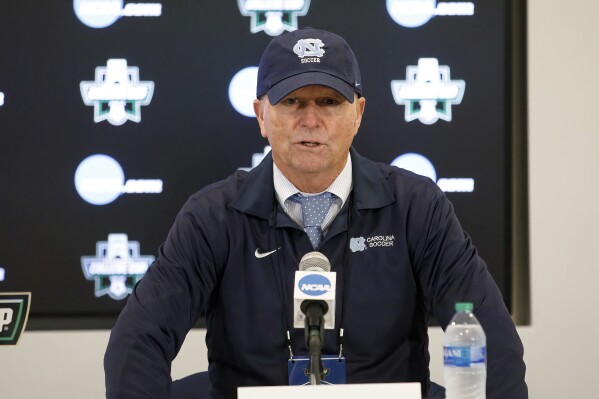 FILE - North Carolina coach Anson Dorrance speaks to the media following the team's win over Florida State in an NCAA women's soccer tournament semifinal in Cary, N.C., Dec. 2, 2022. (AP Photo/Ben McKeown, File)