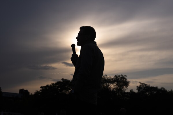 Russian opposition politician Ilya Yashin speaks during an event with supporters at the Mauerpark in Berlin, Germany, Wednesday, Aug. 7, 2024, after being freed in a prisoner swap. (AP Photo/Markus Schreiber)