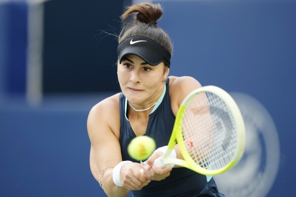 Bianca Andreescu of Canada celebrates a point against Lesia Tsurenko of Ukraine at the National Bank Open in Toronto on Tuesday, August 6, 2024. (Frank Gunn/The Canadian Press via AP)