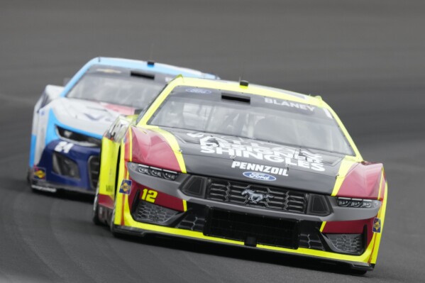 Ryan Blaney drives during the NASCAR Cup Series auto race at Indianapolis Motor Speedway, Sunday, July 21, 2024, in Indianapolis. (AP Photo/Darron Cummings)