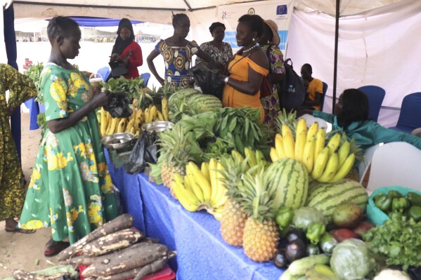 Traders at a 'Made In South Sudan' trade expo sell their goods in Juba, South Sudan, on June 27, 2024. (AP Photo/Deng Machol)