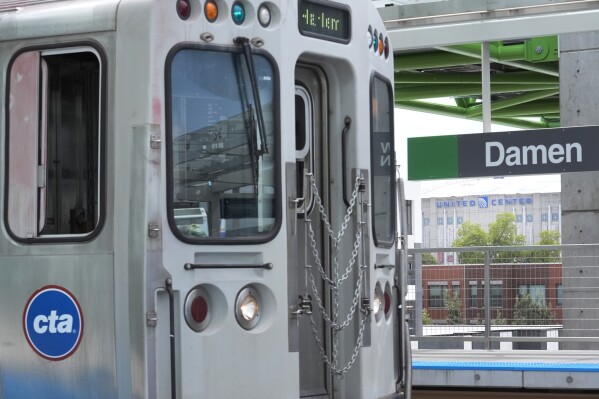 A Chicago Transit Authority train pulls into the new Damen Ave. station just two blocks from the United Center Monday, Aug. 12, 2024, one week before the start of the Democratic National Convention in Chicago. (AP Photo/Charles Rex Arbogast)