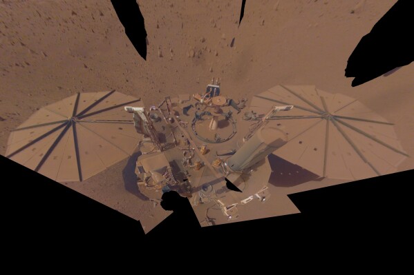 FILE - This image provided by NASA shows the InSight Mars lander in a selfie photo composite on April 24, 2022, the 1,211th Martian day, or sol, of the mission. (NASA/JPL-Caltech via AP, File)