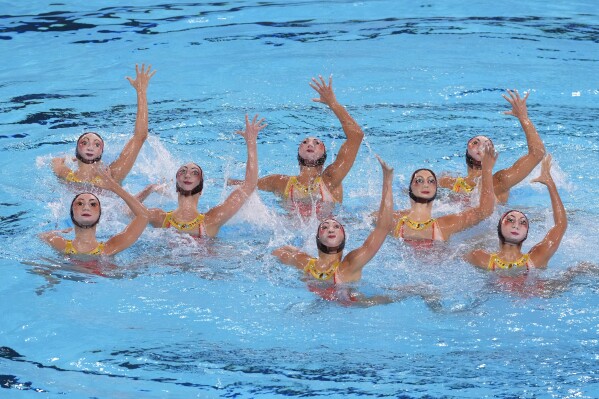 Team France competes in the team free routine of artistic swimming at the 2024 Summer Olympics, Tuesday, Aug. 6, 2024, in Saint-Denis, France. (AP Photo/Lee Jin-man)