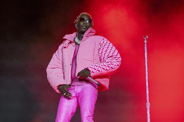 CORRECT FIRST NAME TO: JEFFERY, INSTEAD OF JEFFREY FILE - Young Thug performs on day four of the Lollapalooza Music Festival on Sunday, Aug. 1, 2021, at Grant Park in Chicago. The Atlanta rapper, whose name is Jeffery Lamar Williams, was arrested Monday, May 9, 2022, in Georgia on conspiracy to violate the state's RICO act and street gang charges, according to jail records.  (Photo by Amy Harris/Invision/AP, File)