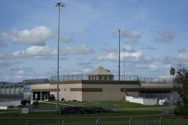 FILE - The Federal Correctional Institution is shown in Dublin, Calif., Monday, March 11, 2024. Two advocacy groups on Wednesday, June 12, 2024, asked a judge to unseal court records and preserve public access to hearings in the class action lawsuit against the federal Bureau of Prisons over sexual abuse of incarcerated women at a now-shuttered California prison. (AP Photo/Jeff Chiu, File)