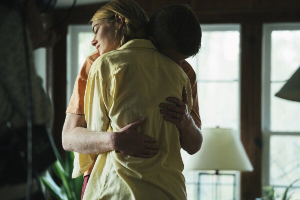 This image released by Searchlight Pictures shows Emma Stone and Jesse Plemons in a scene from "Kinds of Kindness." (Atsushi Nishijima/Searchlight Pictures via AP)