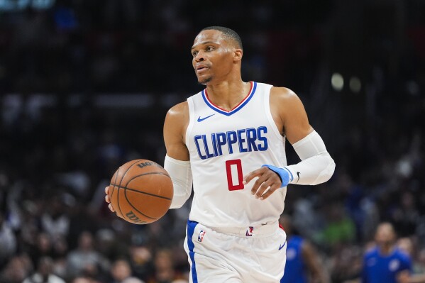 FILE - Los Angeles Clippers guard Russell Westbrook moves up the court during the second half of an NBA basketball game against the Cleveland Cavaliers, April 7, 2024, in Los Angeles. (AP Photo/Ryan Sun, File)