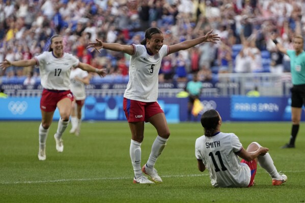 United States' Sophia Smith celebrates with team mates the opening goal during a women's semifinal soccer match between the United States and Germany at the 2024 Summer Olympics, Tuesday, Aug. 6, 2024, at Lyon Stadium in Decines, France. (AP Photo/Silvia Izquierdo)