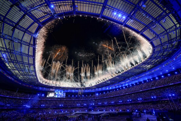 Fireworks explode during the 2024 Summer Olympics closing ceremony at the Stade de France, Monday, Aug. 12, 2024, in Saint-Denis, France. (AP Photo/Petr David Josek)