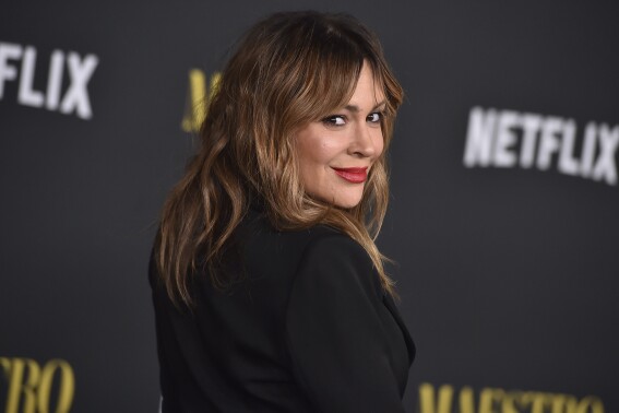 FILE - Alyssa Milano appears at a screening of "Maestro" in Los Angeles on Dec. 12, 2023. (Photo by Jordan Strauss/Invision/AP File)