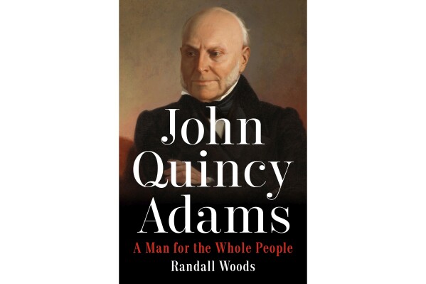 This book cover image released by Dutton shows "John Quincy Adams: A Man for the Whole People" by Randall Woods. (Dutton via AP)