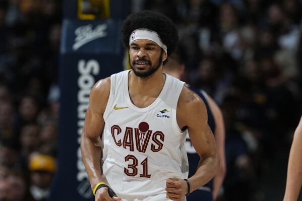 FILE - Cleveland Cavaliers center Jarrett Allen (31) in the second half of an NBA basketball game, March 31, 2024, in Denver. Allen has agreed to a three-year, $91 million contract extension with Cleveland, a person familiar with the negotiations told The Associated Press on Wednesday, July 31. (AP Photo/David Zalubowski, File)