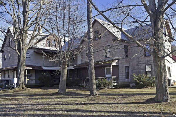 FILE - This Feb. 20, 2017 photo shows the former Veil Maternity Hospital for unmarried women in Corry, Pa., which was renovated into an apartment complex. Veil hospitals offered babies born there for adoption. (Dave Munch/Erie Times-News via AP, File)