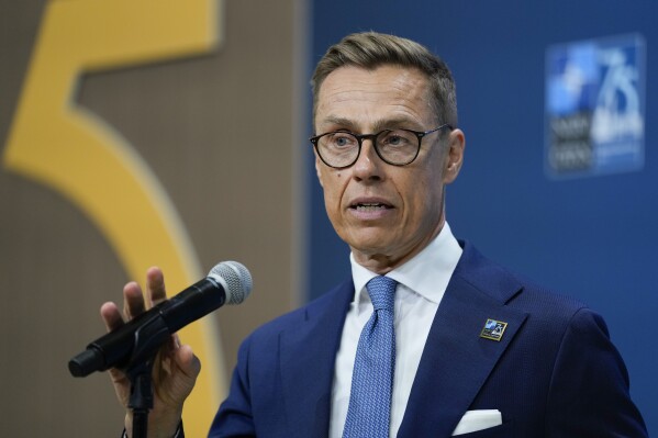 Finland's President Alexander Stubb speaking to members of the media at the NATO summit in Washington, Wednesday, July 10, 2024. (AP Photo/Matt Rourke)