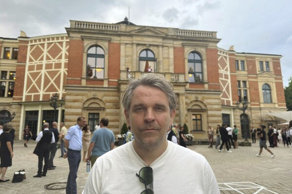 This August 2024 photo shows director Thorleifur Örn Arnarsson outside the Bayreuth Festpielhaus in Bayreuth, Germany during rehearsals for his production of Wagner’s “Tristan und Isolde.” (Thorleifur Örn Arnasson via AP)