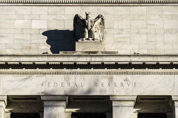 FILE - The Federal Reserve is seen in Washington, on Nov. 16, 2020. The Federal Reserve is expected to signal this week that it will likely reduce borrowing costs as soon as September 2024. (AP Photo/J. Scott Applewhite, File)