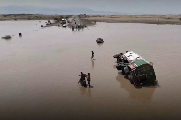 This image made from a video provided by the Ansar Allah Media Office, shows the southern city of Hodeidah, Yemen, where 30 people have been killed and hundreds displaced by flooding, on Wednesday, Aug. 7, 2024. (Ansar Allah Media Office via AP)