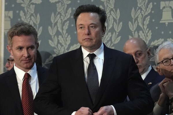 FILE - Elon Musk arrives before a joint meeting of Congress at the Capitol in Washington, July 24, 2024. (AP Photo/Julia Nikhinson, File)