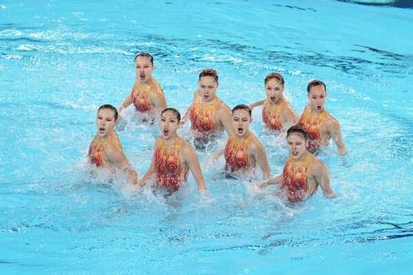 Team China compete in the technical routine of artistic swimming at the 2024 Summer Olympics, Monday, Aug. 5, 2024, in Saint-Denis, France. (AP Photo/Lee Jin-man)