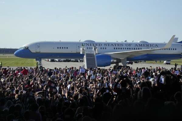 Air Force Two with Democratic presidential nominee Vice President Kamala Harris and her running mate Minnesota Gov. Tim Walz aboard arrive for a campaign rally Wednesday, Aug. 7, 2024, in Romulus, Mich. (AP Photo/Carlos Osorio)