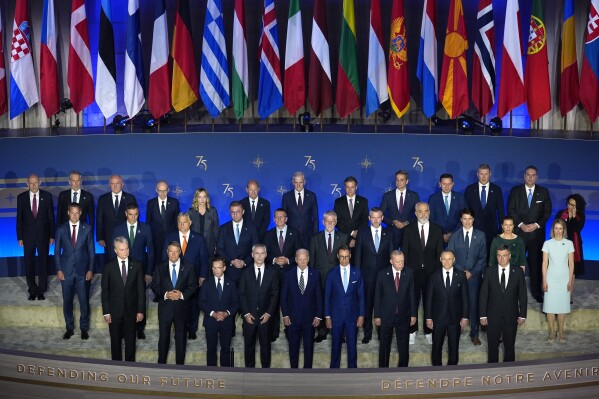 NATO leaders pose for a family photo before President Joe Biden, front row center, delivers remarks on the 75th anniversary of NATO at the Andrew W. Mellon Auditorium, Tuesday, July 9, 2024, in Washington. (AP Photo/Evan Vucci)