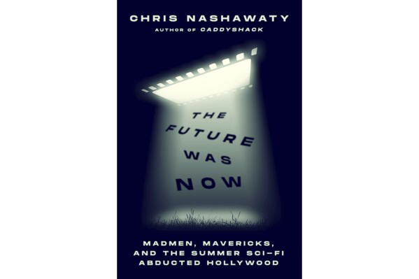 This cover image released by Flatiron shows "The Future Was Now: Madmen, Maverick, and the Summer Sci-Fi Abducted Hollywood" by Chris Nashawaty. (Flatiron Books via AP)