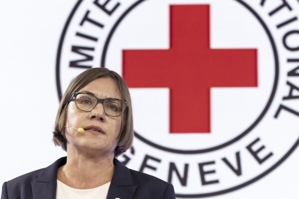 Switzerland's Mirjana Spoljaric Egger, President of the International Committee of the Red Cross, speaks to media during a media briefing to mark the 75th anniversary of the adoption of the Geneva Conventions on 12 August 1949, at the ICRC headquarters in Geneva, Switzerland, Monday, August 12, 2024. (Salvatore Di Nolfi/Keystone via AP)