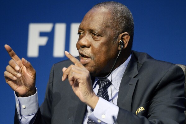 FILE - Issa Hayatou, acting FIFA President, speaks during a news conference at FIFA Headquarters in Zurich, Switzerland, Dec. 3, 2015. (Walter Bieri/Keystone via AP, File)