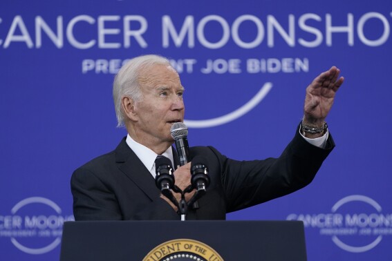 FILE - President Joe Biden speaks on the cancer moonshot initiative at the John F. Kennedy Library and Museum, Sept. 12, 2022, in Boston. (AP Photo/Evan Vucci)