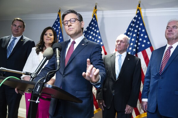 Speaker of the House Mike Johnson, R-La., conducts a news conference at the Republican National Committee after a meeting with Republican presidential candidate former President Donald Trump and the House Republican Conference on Thursday, June 13, 2024. Also appearing from left are, Rep. Richard Hudson, R-N.C., chairman of the National Republican Congressional Committee, House Republican Conference Chair Elise Stefanik, R-N.Y., House Majority Leader Steve Scalise, R-La., and House Majority Whip Tom Emmer, R-Minn. (Tom Williams/Pool via AP)