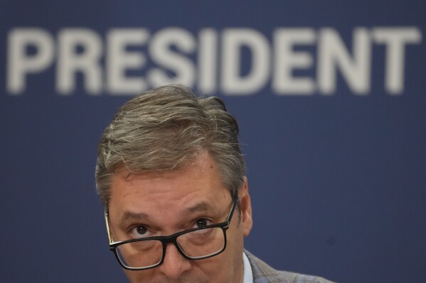 Serbian President Aleksandar Vucic speaks during a public address, a day after one of the biggest protests in years in Belgrade, Serbia, Sunday, Aug. 11, 2024. Vucic said earlier he had been tipped off by Russian intelligence services that a "mass unrest and a coup" were being prepared in Serbia by unspecified Western powers that wish to oust him from power. (AP Photo/Darko Vojinovic)