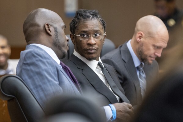 FILE - Young Thug, whose real name is Jeffery Williams, appears at a hearing, Dec. 22, 2022, in Atlanta. The new judge presiding over the racketeering and gang prosecution of rapper Young Thug and several other defendants said Friday, July 19, 2024, that the trial has gone on for a really long time and she plans to move it forward expeditiously. (Arvin Temkar/Atlanta Journal-Constitution via AP, File)