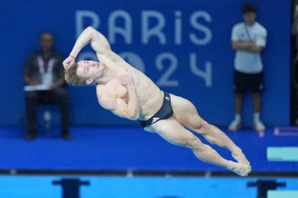 FILE- Britain's Jack Laugher competes in the men's 3m springboard diving preliminary at the 2024 Summer Olympics, Tuesday, Aug. 6, 2024, in Saint-Denis, France. (AP Photo/Dar Yasin, File)