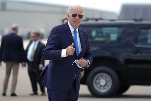 President Joe Biden arrives to board Air Force One at Dover Air Force Base, in Dover, Del., Tuesday, July 23, 2024. Biden is returning to the White House from his Rehoboth Beach home after recovering from a COVID-19 infection. (AP Photo/Manuel Balce Ceneta)