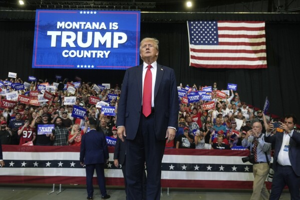 Republican presidential nominee former President Donald Trump arrives for a campaign rally in Bozeman, Mont., Friday, Aug. 9, 2024. (AP Photo/Rick Bowmer)