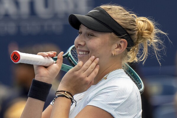 Amanda Anisimova of the USA celebrates her win over Emma Navarro of the USA in semifinal action at the National Bank Open in Toronto on Sunday August 11, 2024. (Frank Gunn/The Canadian Press via AP)