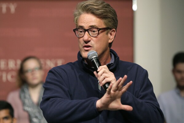 FILE - MSNBC “Morning Joe” host Joe Scarborough takes questions from the audience, Oct. 11, 2017, on the campus of Harvard University, in Cambridge, Mass. The four-hour morning news and talk show was pulled off the air Monday, July 15, 2024, in favor of a live news feed focused on covering the aftermath of Saturday's assassination attempt on former President Donald Trump. (AP Photo/Steven Senne, File)