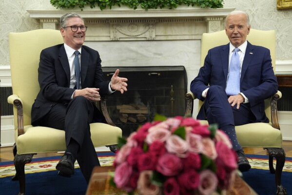 President Joe Biden meets with British Prime Minister Keir Starmer in the Oval Office of the White House, Wednesday, July 10, 2024, in Washington. (AP Photo/Evan Vucci)