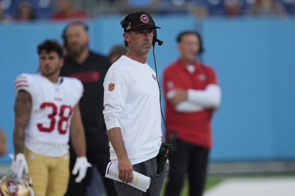 San Francisco 49ers head coach Kyle Shanahan looks on from the sideline during the first half of an NFL preseason football game against the Tennessee Titans, Saturday, Aug. 10, 2024, in Nashville, Tenn. (AP Photo/Mike Stewart)