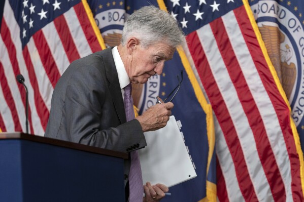 Federal Reserve Board Chairman Jerome Powell leaves after speaking during a news conference at the Federal Reserve Board Building Tuesday, Wednesday, July 31, 2024, in Washington. (AP Photo/Jose Luis Magana)