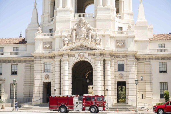 A Pasadena firetruck responds to Pasadena City Hall on Monday, Aug. 12, 2024, in Pasadena, Calif, after an earthquake was strongly felt from the Los Angeles area all the way to San Diego. (Sarah Reingewirtz/The Orange County Register via AP)