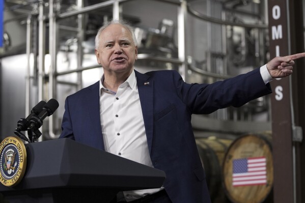 FILE - Gov. Tim Walz, D-Minn., speaks before President Joe Biden at the Earth Rider Brewery, Jan. 25, 2024, in Superior, Wis. (AP Photo/Alex Brandon, File)