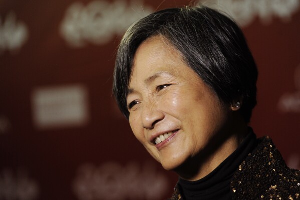 FILE- Actress Cheng Pei-pei, a cast member in the film "Lilting," poses at the premiere of the film at the 2014 Sundance Film Festival on Thursday, Jan. 16, 2014, in Park City, Utah. (Photo by Chris Pizzello/Invision/AP, File)