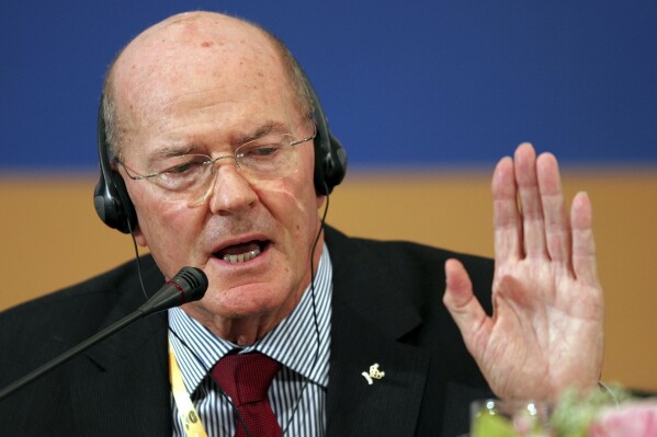 FILE - Senior International Olympic Committee member Kevan Gosper speaks at a news conference in Beijing, April 10, 2008. (AP Photo/Greg Baker, File)