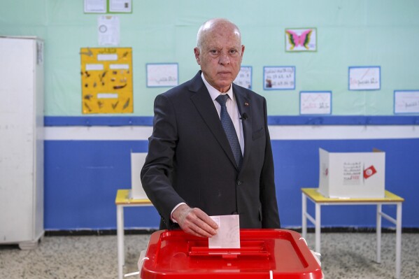 FILE - Tunisia's President Kais Saied casts his ballot during legislative elections in Tunis, Dec. 17, 2022. (AP Photo/Slim Abid, File)