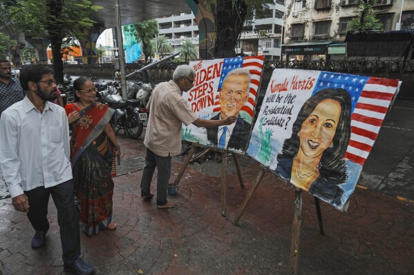 Art teacher Prithvi Raj Kambli makes paintings of U.S. President Joe Biden and Vice President Kamala Harris, in Mumbai, India, Monday, July 22, 2024. (AP Photo/Rafiq Maqbool)