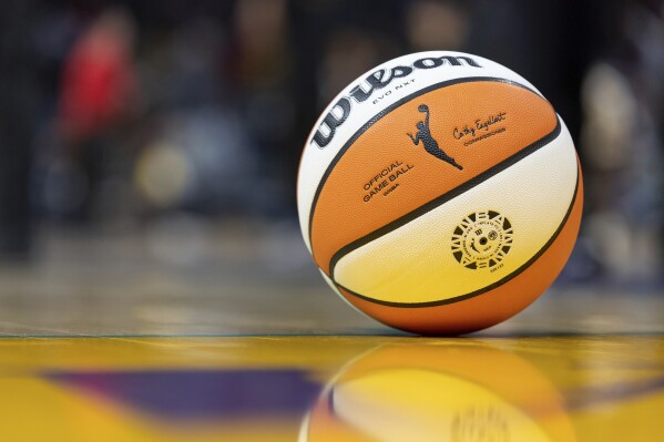 FILE - A WNBA basketball sits on the court during a WNBA game, May 19, 2023, in Los Angeles. (AP Photo/Jeff Lewis, File)